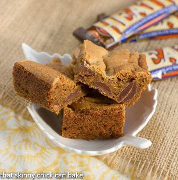 Heath Bar Blondies in a white ceramic leaf shaped dish