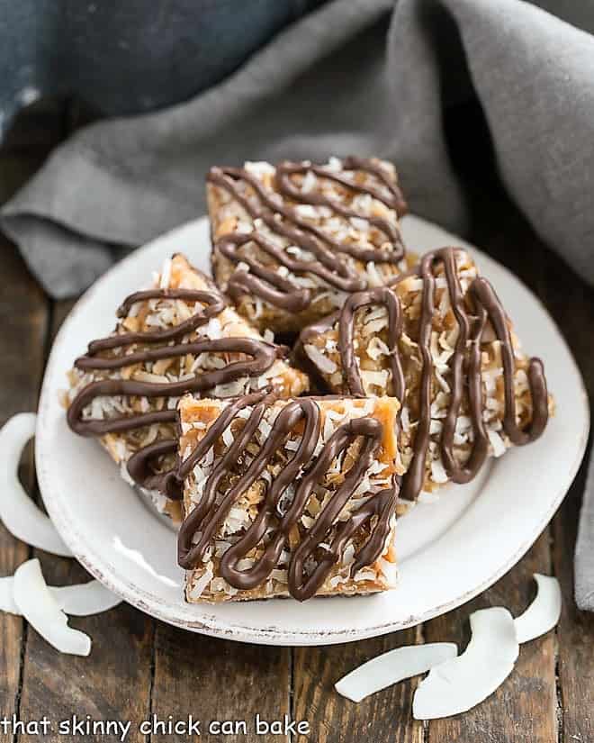 Homemade Samoa Bars on a round white plate