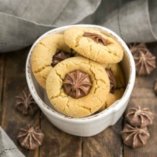Star of Bethlehem Cookies AKA Peanut Blossoms | The classic peanut butter cookie topped with a chocolate star for the holidays!