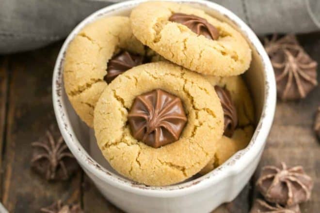 Star of Bethlehem Cookies AKA Peanut Blossoms | The classic peanut butter cookie topped with a chocolate star for the holidays!