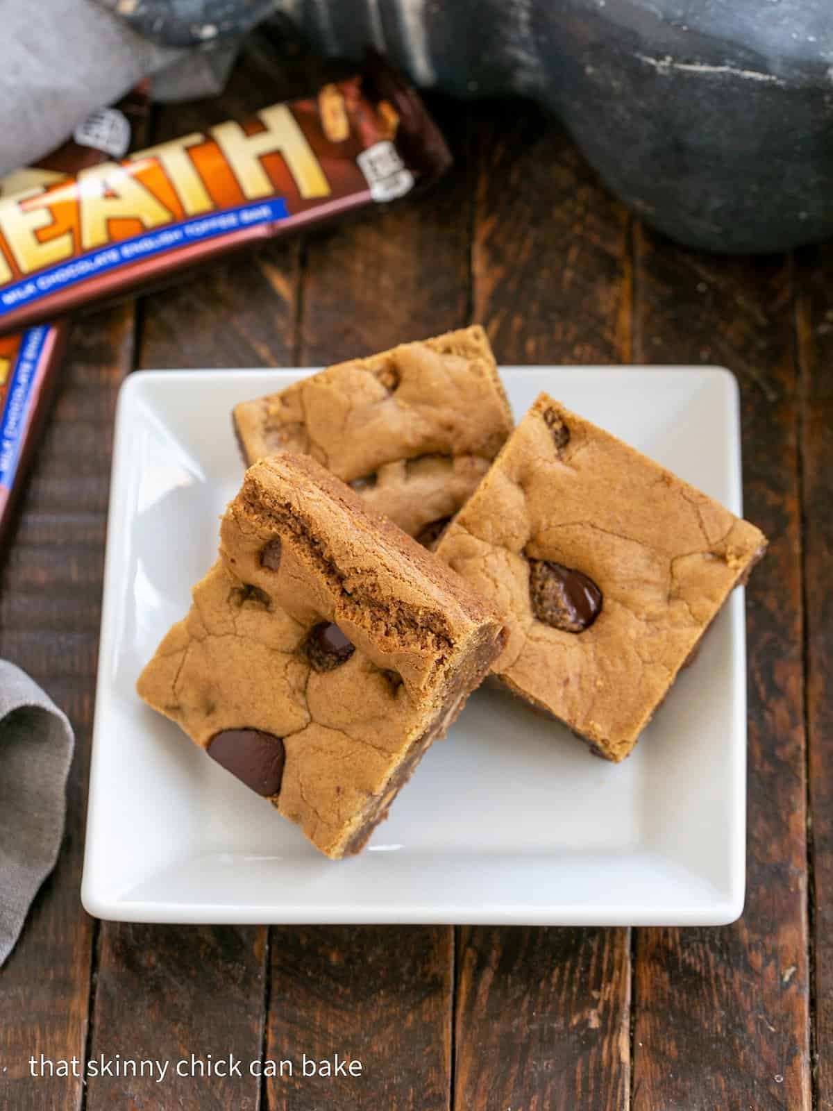 3 Toffee Blondies on a square white plate.