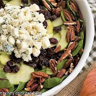 Overhead view of Loaded Winter Salad with Apples, Pecans, Blue Cheese and Dried Cherries