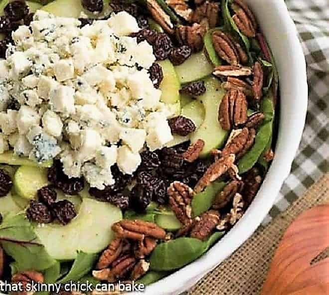 Overhead view of Loaded Winter Salad with Apples, Pecans, Blue Cheese and Dried Cherries.