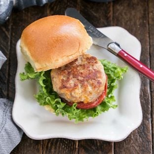 Overhead view of mini turkey burger on a square white plate