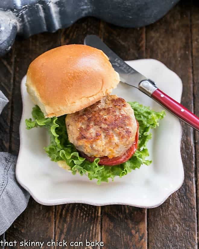 Overhead view of mini turkey burger on a square white plate