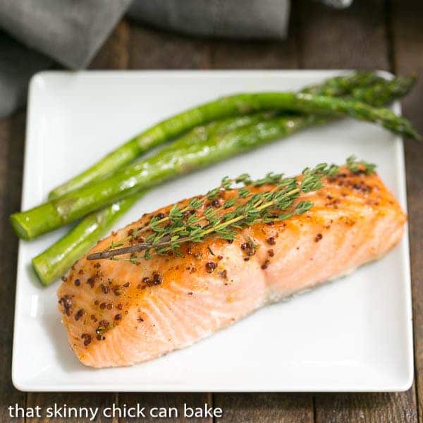 Maple Mustard Glazed Salmon on a white square plate.