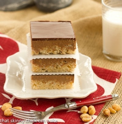 Chocolate Peanut Butter Krispie Bars Stacked on a square white plate