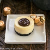 One Mini Rolo Cheesecake on a square white plate with Rolos