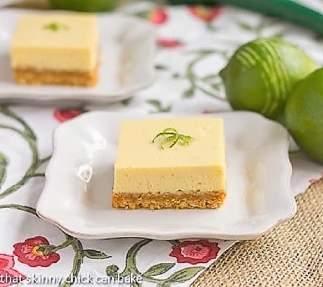 Key Lime Bars on square white plates