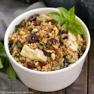 Mediterranean Quinoa Salad with Olives, Basil and Sun-dried Tomatoes | Loaded with flavor and simply dressed with olive oil and balsamic!