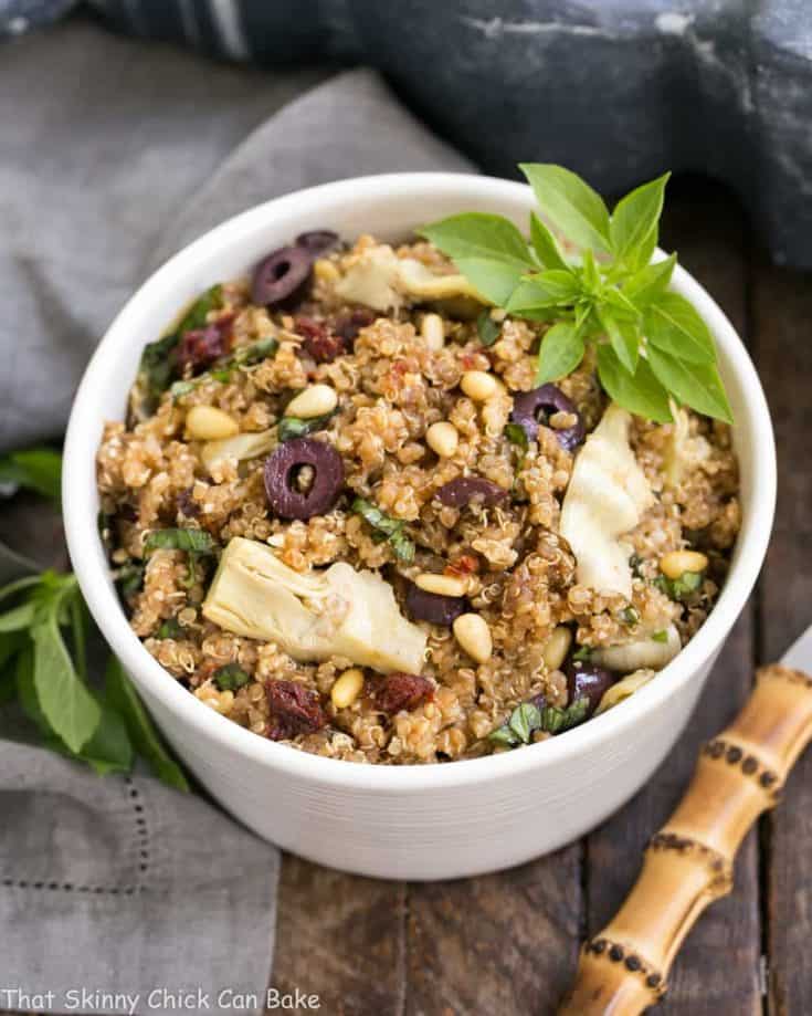 Mediterranean Quinoa Salad with Olives, Basil and Sun-dried Tomatoes | Loaded with flavor and simply dressed with olive oil and balsamic!