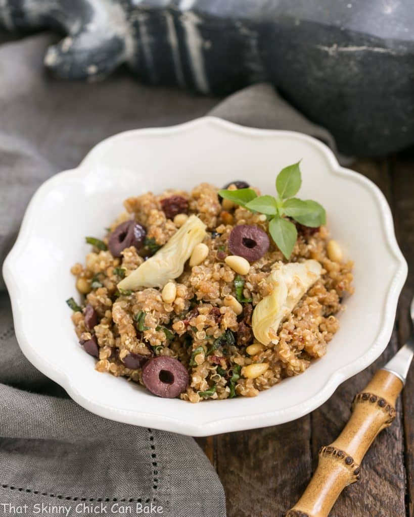 Mediterranean Quinoa Salad with Olives, Basil and Sun-dried Tomatoes | Loaded with flavor and simply dressed with olive oil and balsamic!
