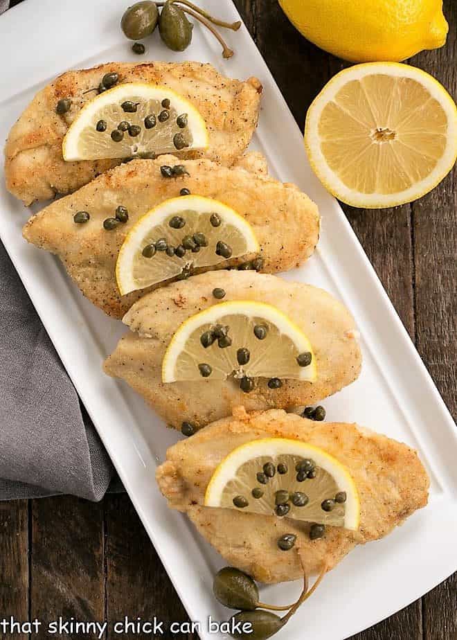 Easy Skillet Chicken Piccata on a rectangular white platter