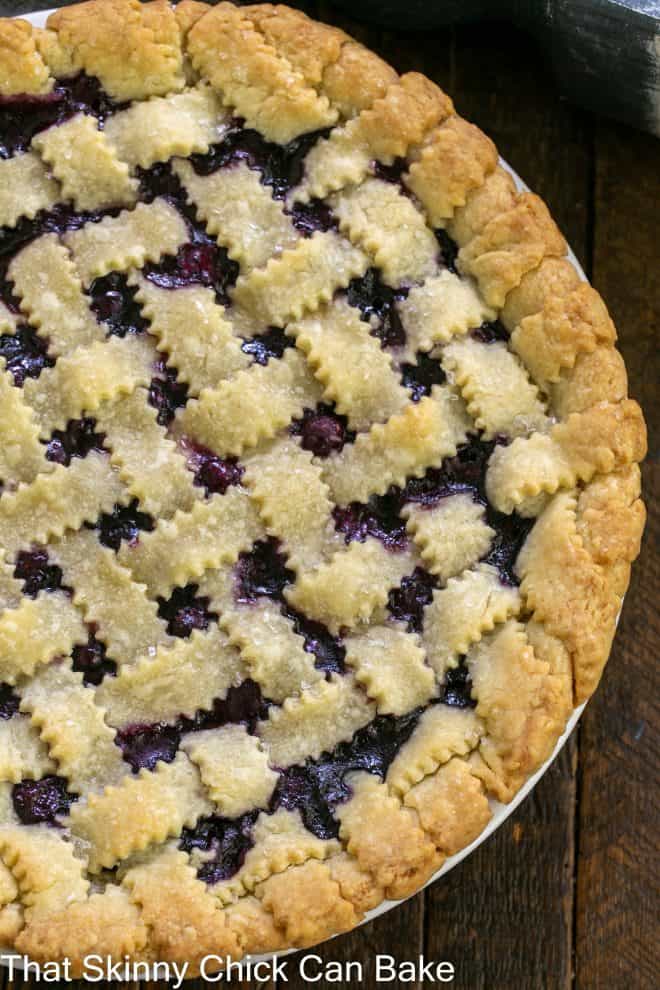 Overhead view of blueberry pie with a lattice crust