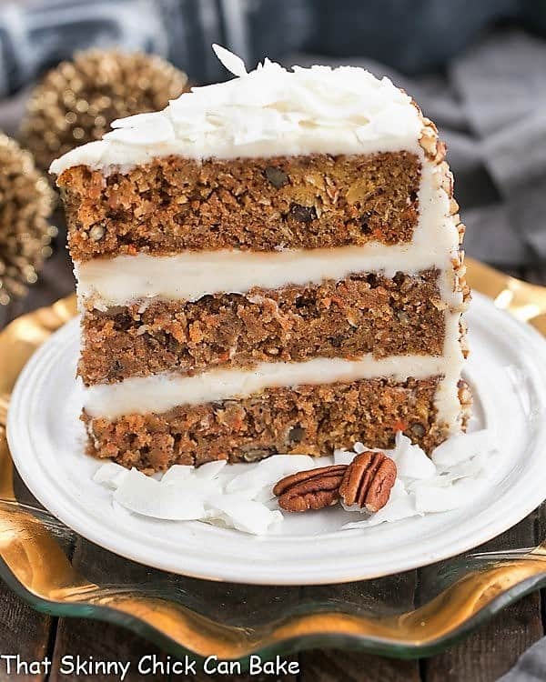 Slice of 3 Caramel Filled Carrot Cake on a white dessert plate