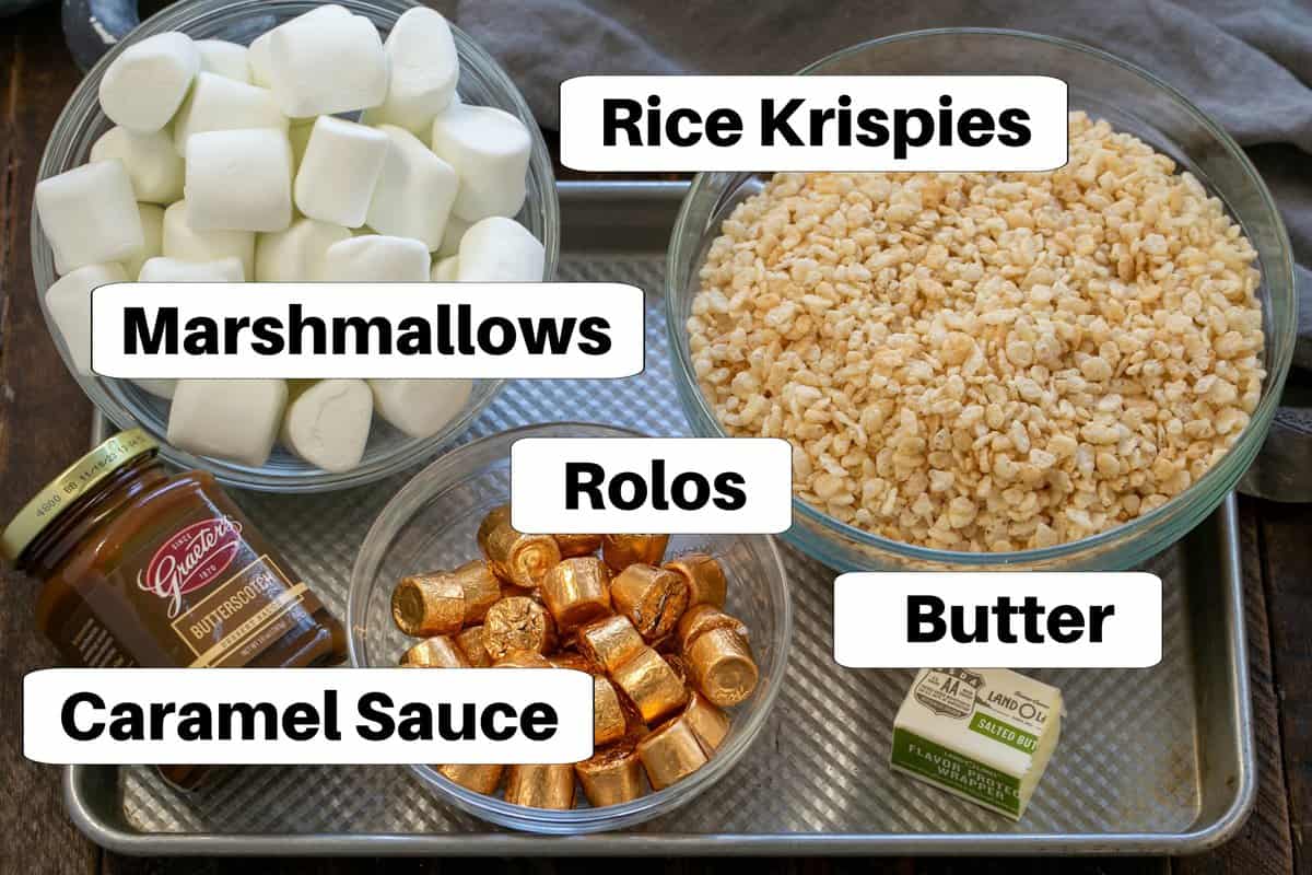 Labeled ingredients for caramel rolo rice krispie treats on a sheet pan.