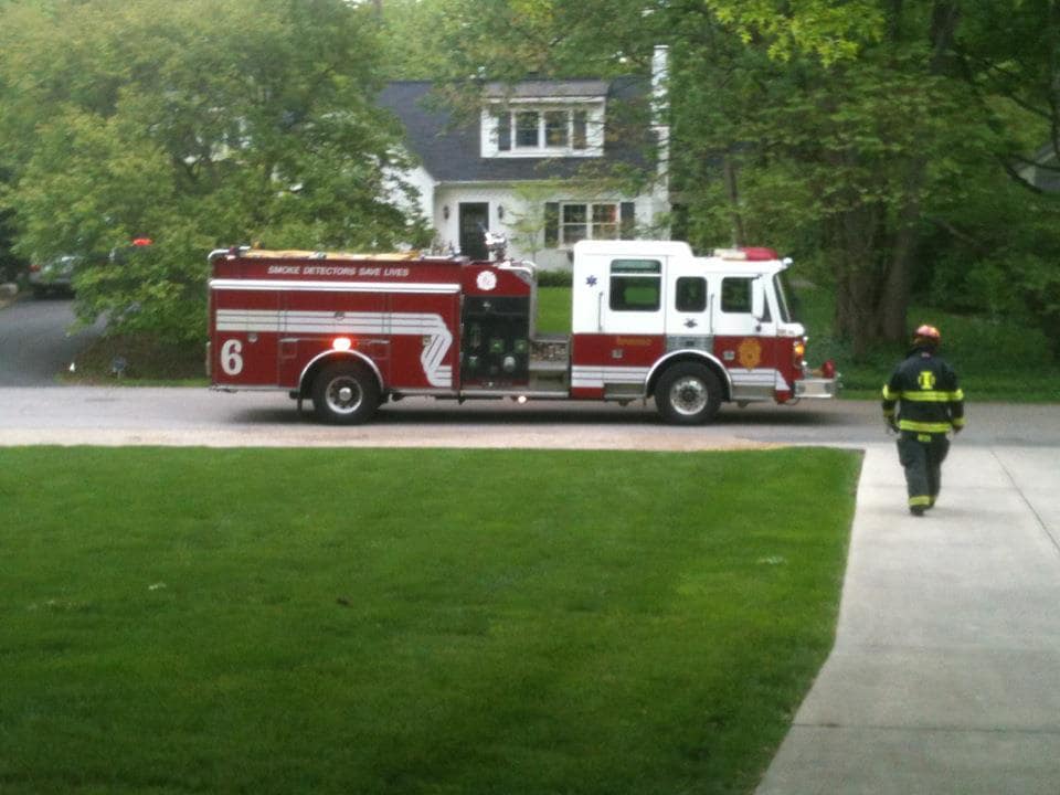 Fire truck in front of house