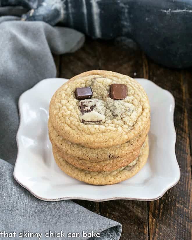 Stack of Brown Sugar Chocolate Chunk Cookies on a square white plate