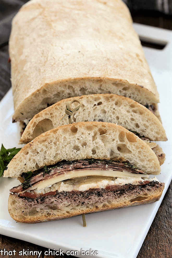 Pressed Brick Sandwich on a white cutting board.