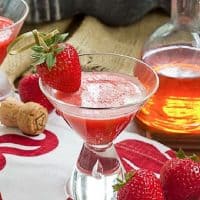 Strawberry Bellinis garnished with frresh strawberries