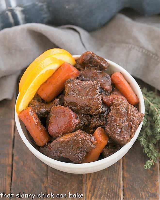 Overhead view Beef Stew with red wine in a white bowl.