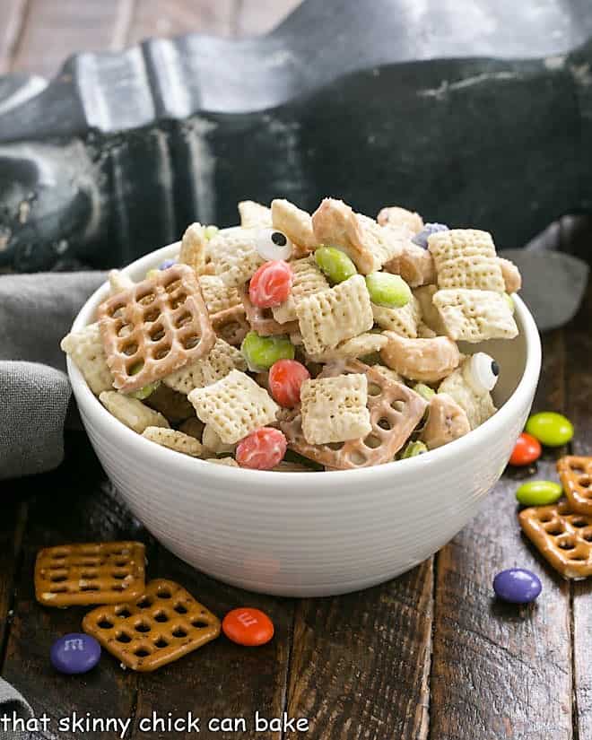 White bowl filled with white chocolate chex mix
