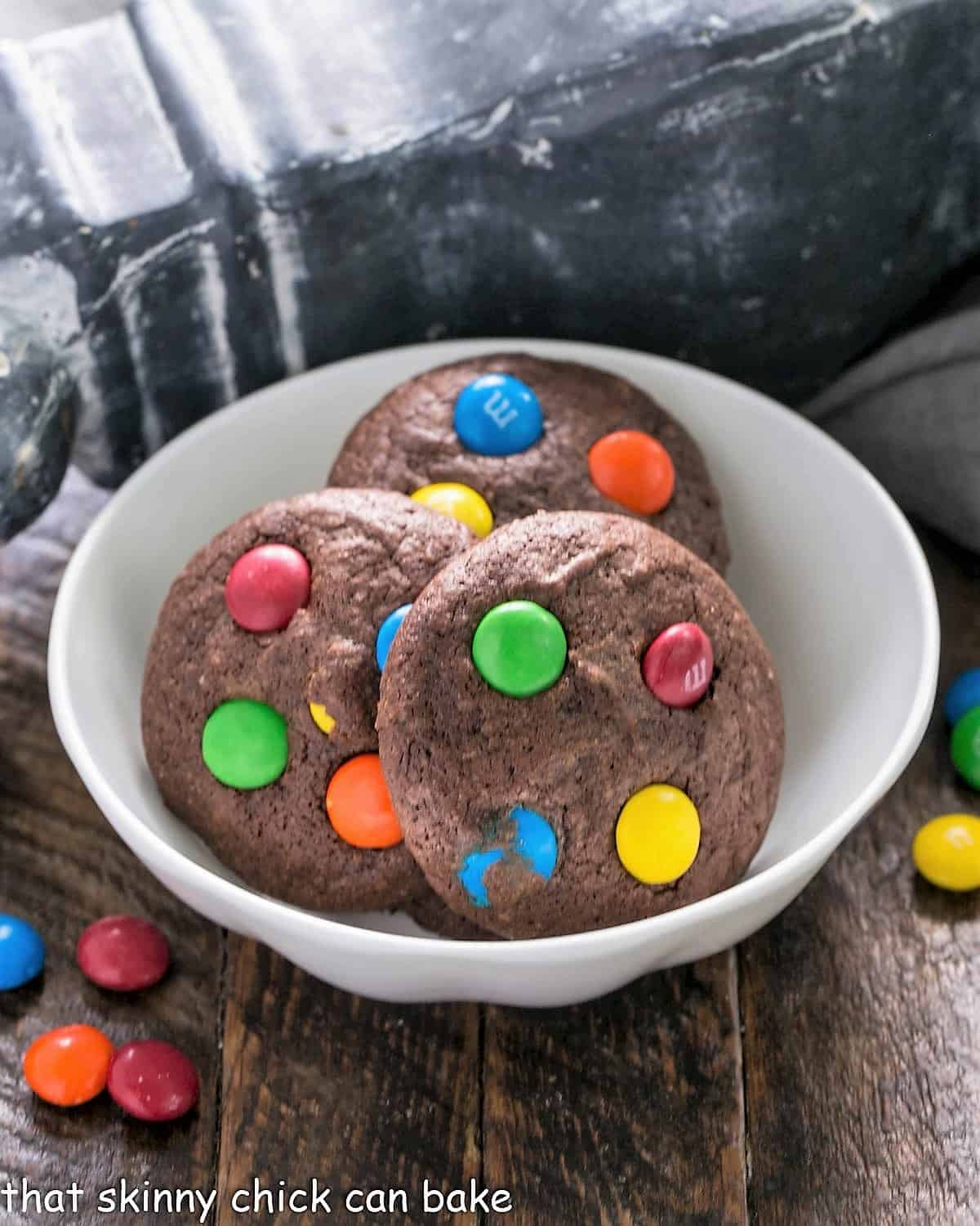 M&M Brownie cookies in a white bowl.