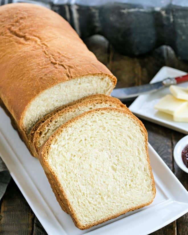 Homemade Potato bread on a white ceramic platter