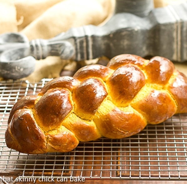 Pumpkin Challah on a cooling rack