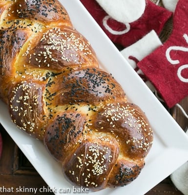  Perfect Braided Challah from Baking with Julia on a white ceramic tray.