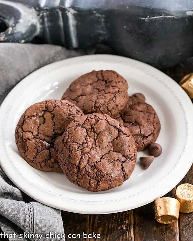 Rolo Brownie Cookies stacked on a white dessert plate