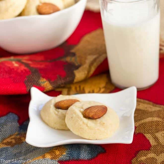 Ghraybeh or Lebanese Shortbread Cookies on a small white plate and in a white bowl