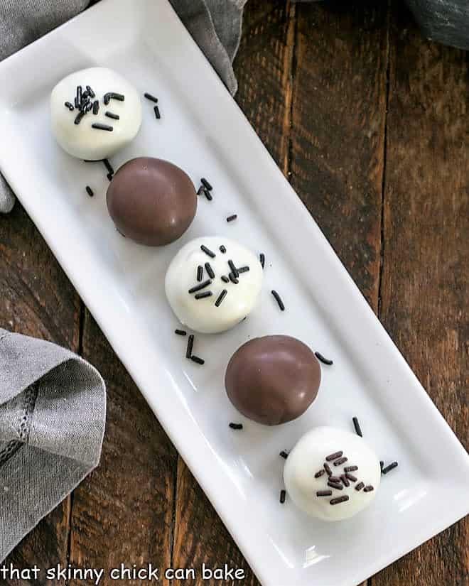 Overhead view of Oreo Truffles on a white tray.