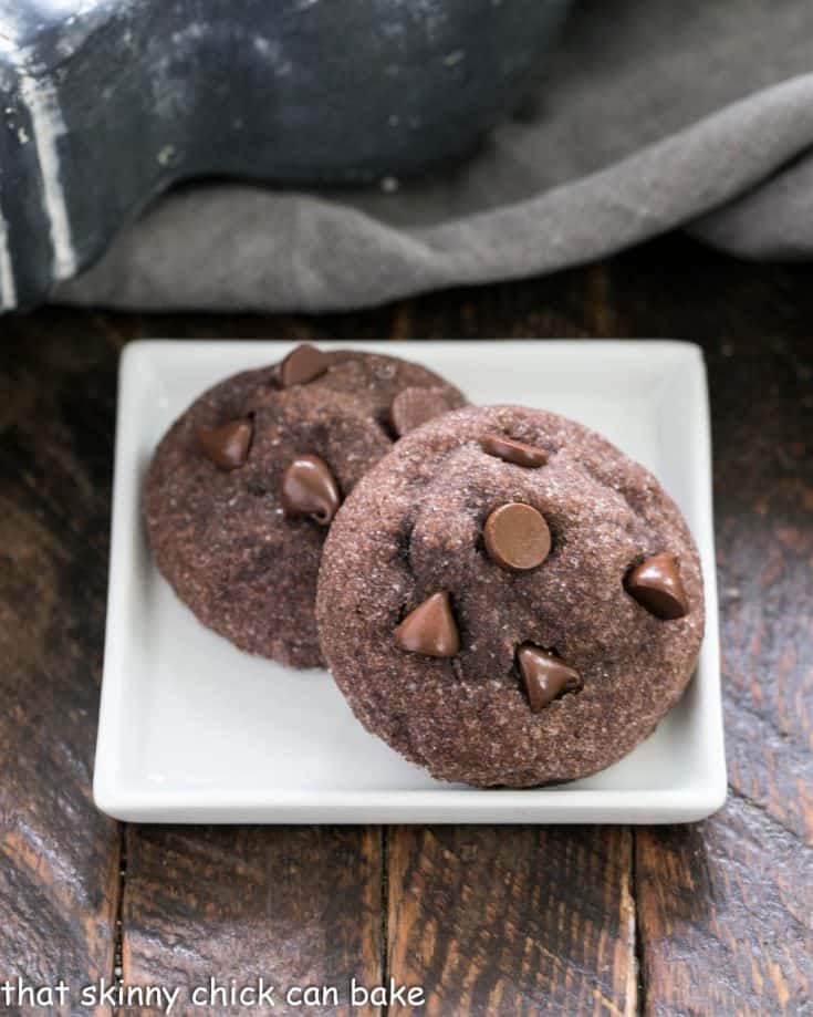 Filled Peanut butter cookies on a square white plate.