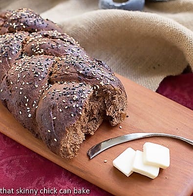 Pumpernickel Loaves on a wooden cutting board