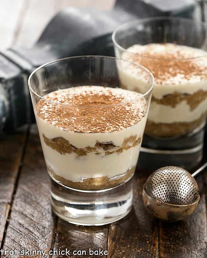 Two tiramisu parfaits and a cocoa duster