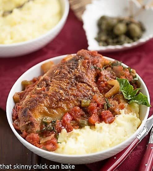 Easy Chicken Cacciatore - a classic Italian dish with tomatoes, mushrooms and herbs for an easy comforting dinner! Easy Chicken Cacciatore in a bowl with mashed potatoes