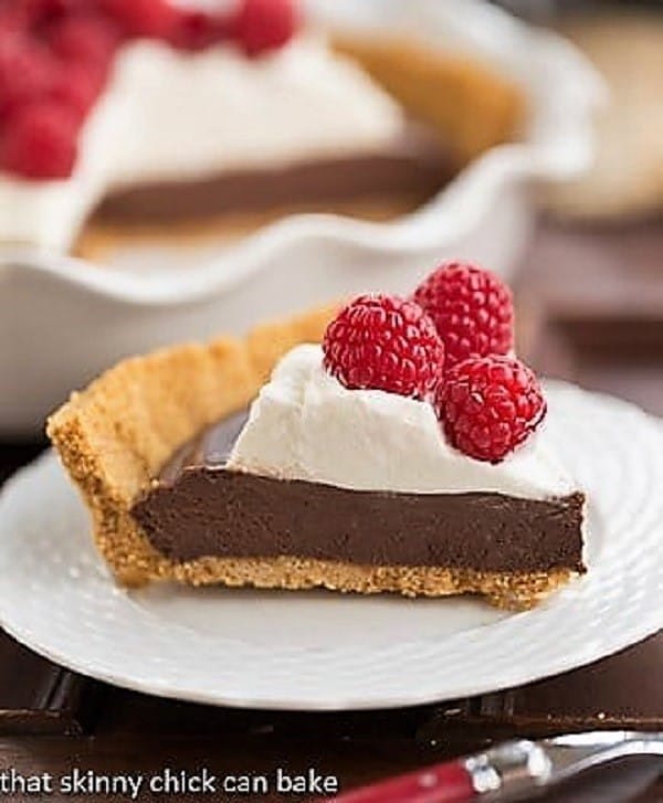 Chocolate Satin Pie slice on a white dessert plate.