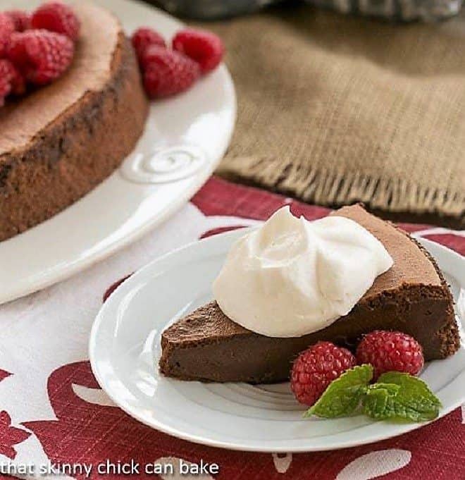 Chocolate Mousse Torte topped with whipped cream