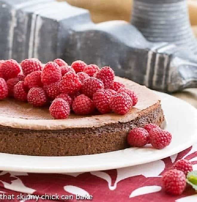 Chocolate Mousse Torte covered with fresh raspberries