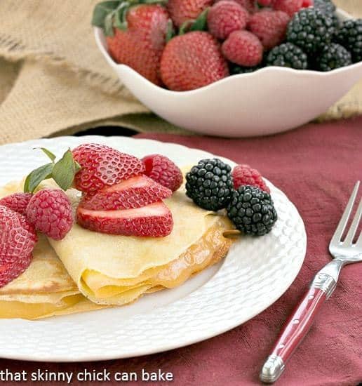 Butter and Rum Crepes | Dosed with Grand Marnier and rum and filled with lemon curd, these are no ordinary crepes!