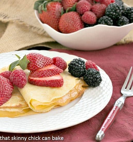 Butter and Rum Crepes | Dosed with Grand Marnier and rum and filled with lemon curd, these are no ordinary crepes!