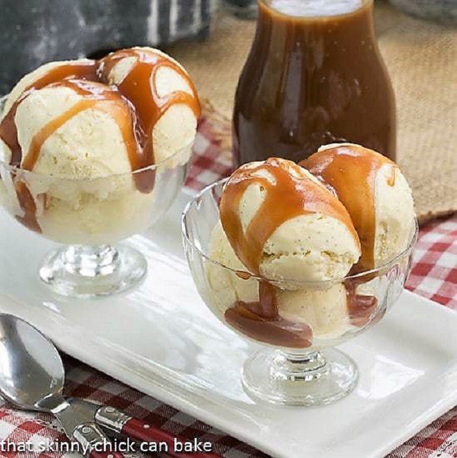 Caramel Topped Sundaes in glass dishes on a white tray