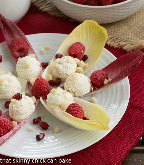 Endive Cups with Blue Cheese, Raspberries and Macadamia Nuts.