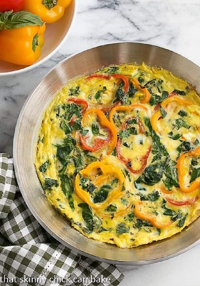 Spinach Bell Pepper Frittata - A versatile dish that's delicious for any meal of the day Spinach Frittata in a saute pan