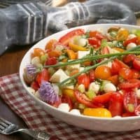 Caprese Salad with Chicken in a white serving bowl