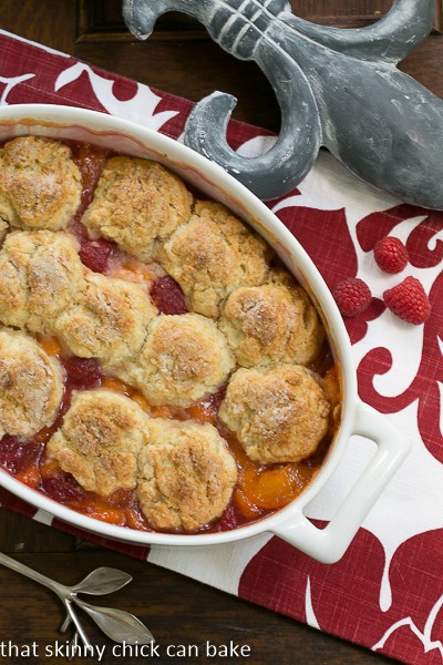 Overhead view of a Fruit Cobbler in a white, oval casserole dish.