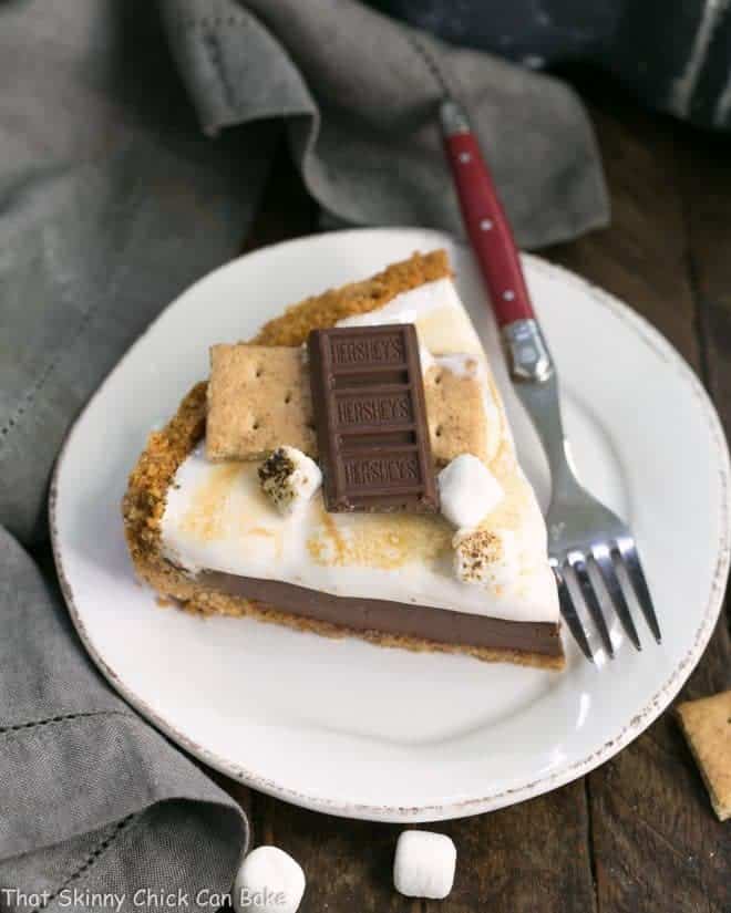 S'mores Pie slice on a white dessert plate
