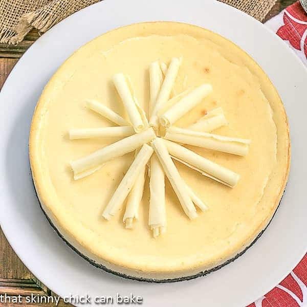 White Chocolate Frangelico Cheesecake | A luscious cheesecake with a chocolate cookie crust, white chocolate and a slosh of Frangelico