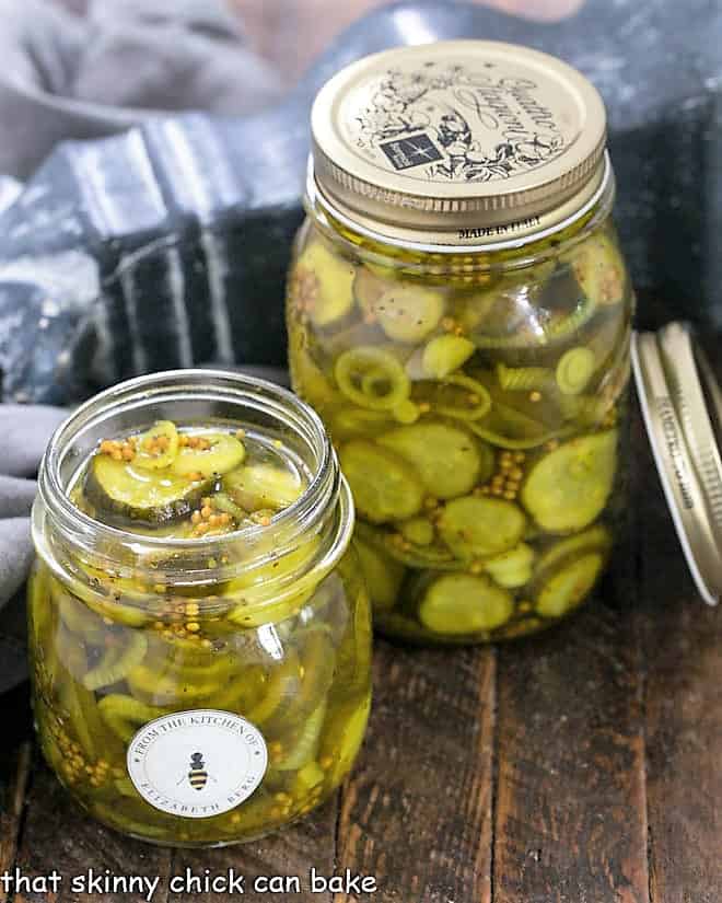 Two jars of Easy Bread and Butter Pickles, one without a lid.